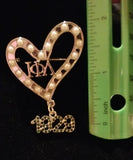 A 💚 for Iota Phi Lambda pin