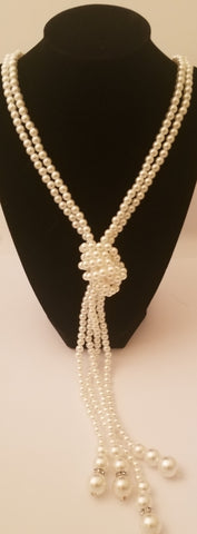 Double-knotted pearl necklace