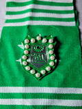 Pearl and emerald emblem pin