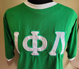 Green/white Greek letter ringer tee