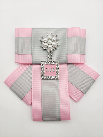 Pink/Silver jeweled ribbon brooch